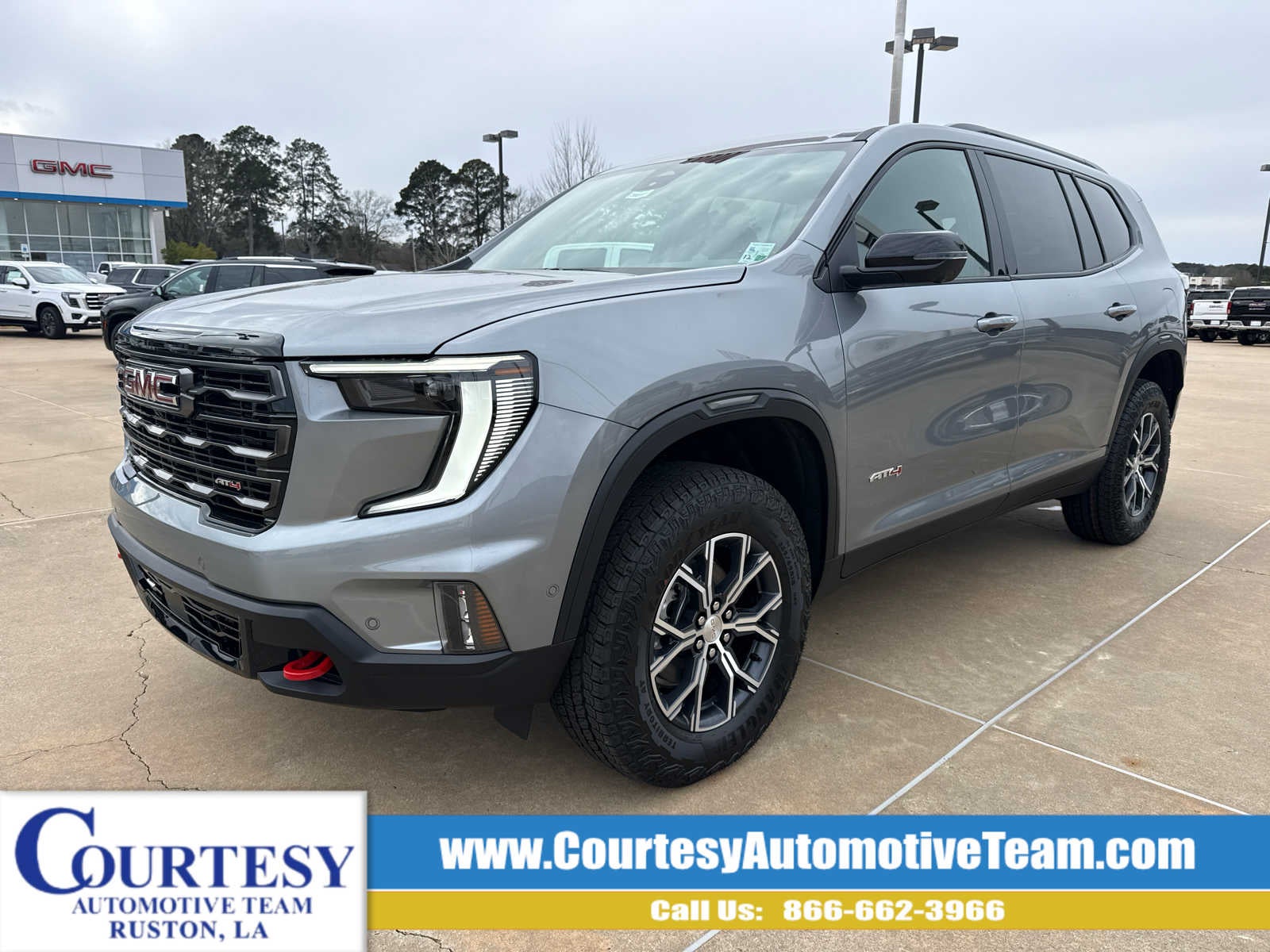 2026 GMC Acadia AT4 in Sterling Metallic — front three-quarter view