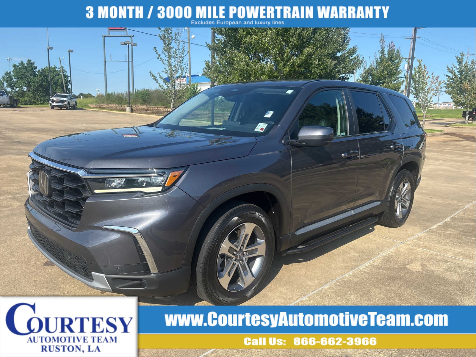 2023 Honda Pilot EX-L 8 Passenger in Gray — front three-quarter view